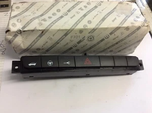 GENUINE FIAT GRANDE PUNTO BOOT RELEASE DOOR LOCK HAZARD SWITCHES FACIA 735446471 - Picture 1 of 3