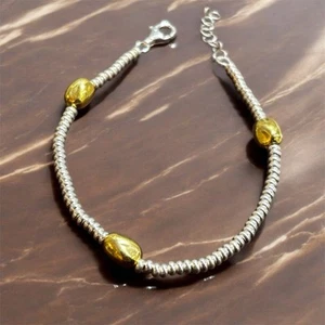 Bracciale Armonia in argento 925 con pepite dorate - Foto 1 di 3