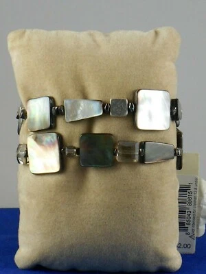 Pulsera Kenneth Cole Shell Brilliance Gris Tono Plateado Geométrico Elástico $42 Foto 1 de 2