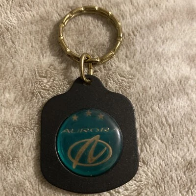 Llavero AURORA Vintage Nuevo Antiguo Stock Metal Acrílico Gen. Motors Foto 1 de 4