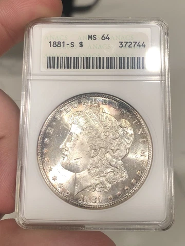 1881-S Morgan Dollar graded MS64 by ANACs Soapbox Holder Rim Toned Nice Luster Cover