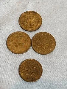 LOTE de 4 monedas Eagle Token 3 sin valor en efectivo y 1 con herradura de la suerte sobre estrella #F13 - Imagen 1 de 4