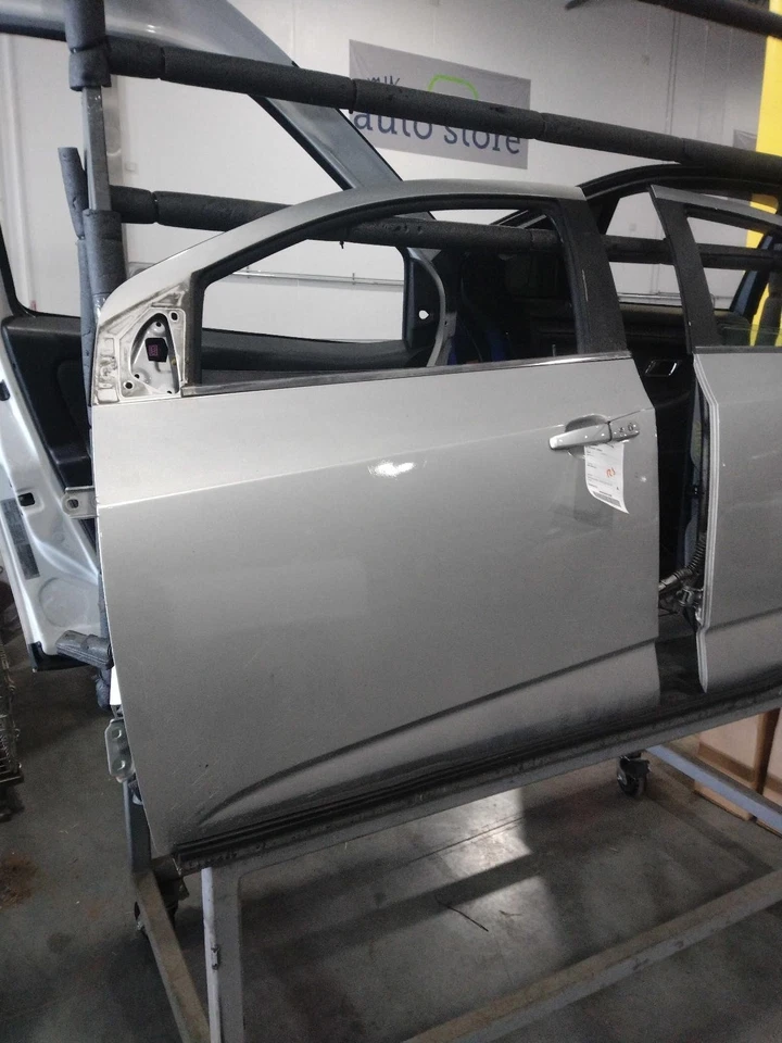 Conjunto de puerta delantera izquierda usado se adapta a: Chevrolet Sonic 2018 eléctrico delantero Le Foto 1 de 4