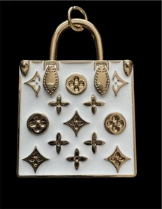 Louis Vuitton Handtasche Reißverschluss Zugknopf Anhänger weiß - Bild 1 von 4