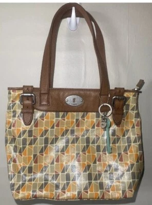 NUEVO CON ETIQUETAS Fossil Llave por Cartera Muñequera Diseño Geométrico Naranja Bronceado Recubierto Juego de Lona Foto 1 de 4