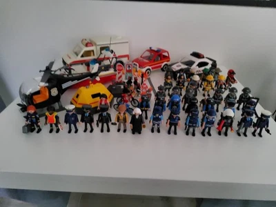 40 personnages PLAYMOBIL Police USA et autres + 5 véhicules, jamais servis - Photo 1/4