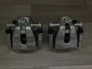 Freelander 2 rear brake caliper LH & RH with pads & carrier New genuine - Picture 1 of 5