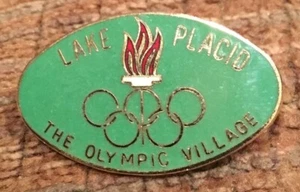 1980 GREEN  WINTER OLYMPICS LAKE PLACID THE OLYMPIC VILLAGE PIN - Picture 1 of 2
