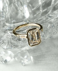 3 Ct Emerald Cut Moissanite Three Stone Engagement Ring 14K Yellow Gold Plated - Picture 1 of 9