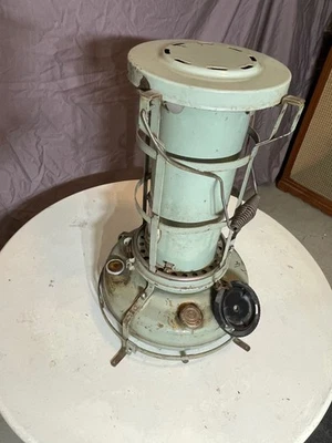 Calentador de queroseno portátil de metal envejecido con llama azul Aladdin de colección probado  Foto 1 de 4