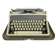 Vintage 1960’s Olympia SM7 De Luxe Portable Typewriter with Case.
