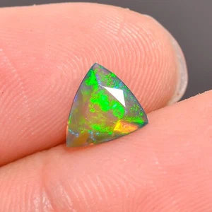 0.55 Ct Natural Black Ethiopian Opal Trillion Shape Faceted Cut Gemstone 7X6X3mm - Picture 1 of 5