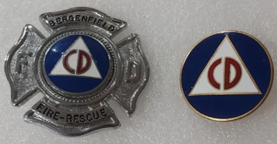 Insignia obsoleta del Departamento de Bomberos de Defensa Civil - Rescate e insignia de pin de tapa de CD Foto 1 de 2