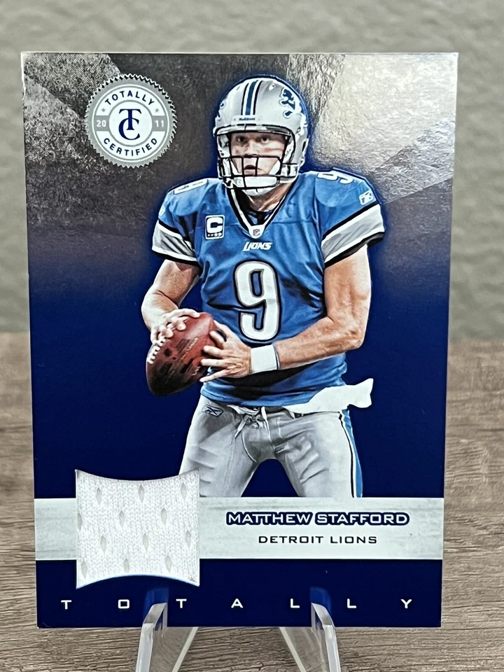 2011 Totally Certified Blue Materials Matthew Stafford #69 Worn Jersey 38/99 - Image 1 of 2