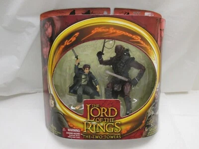 Toybiz Señor de los Anillos Dos Torres UGLUK URUK-HAI Espada PIPPIN Figura NUEVO Foto 1 de 4
