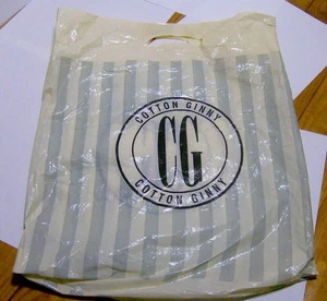 Vintage 1980er BAUMWOLLE GINNY Bekleidungsgeschäft KUNSTSTOFF EINKAUFSTASCHE kanadisch nicht mehr funktionsfähig - Bild 1 von 2