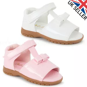 Girls Sandals Spanish Bow Tbar Shiny Patent Menorcan Style Baby White Pink NEW - Picture 1 of 5