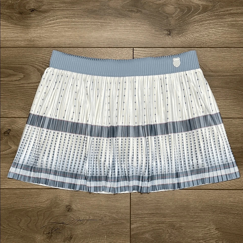 Falda corta tenis bolsillo plisada tiro alto K-Swiss azul blanco talla mediana Foto 1 de 4