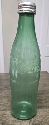 Raro prototipo de Coca Cola años 70 botella de plástico verde 32 oz de Monsanto con tapa Foto 1 de 4