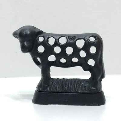 Candelabro vintage de hierro fundido negro de vaca con luz de té lindo diseño Foto 1 de 4