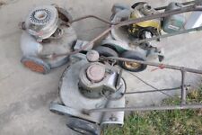 Three vintage push lawn mowers, two are Goodall mowers, other is not known.