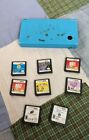 Nintendo DSi Light Blue Handheld Console Game System With 8 Games No Charger
