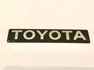 1987-1998 Toyota Tercel Corolla Celica Trunk Deck Lid Badge Emblem Genuine 7094 - Picture 1 of 2