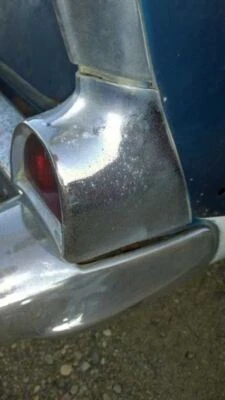 1957 CHEVROLET BEL AIR RIGHT TAIL LIGHT ASSEMBLY 4 DOOR HARD TOP 1012570 - Image 1 of 4