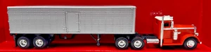 Camion giocattolo Peterbilt Long Hauler scala 1:43 nuovo Ray arancione modello pressofuso nuovo con scatola - Foto 1 di 18