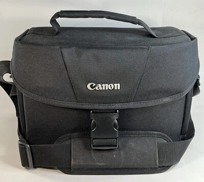 "Bolsa para cámara Canon de lona negra con correa para el hombro divisor ajustable de 12"" LIMPIA" Foto 1 de 4