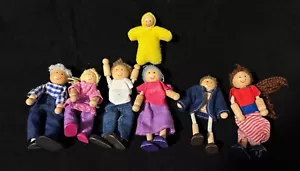 Set 7 mini bambole flessibili in legno - Foto 1 di 6
