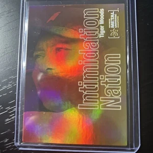 Tiger Woods 2021 Skybox Metal Universe Champions Intimidation Nation #IN-25 - Picture 1 of 3