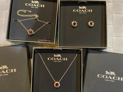 Joyería Coach - Pendientes, pulsera y collar rojo rubí, juego a juego Foto 1 de 4