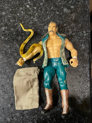 Figura de acción Jakks WWE Classic Superstars Jake The Snake Roberts bolsa verde 2003 Foto 1 de 3