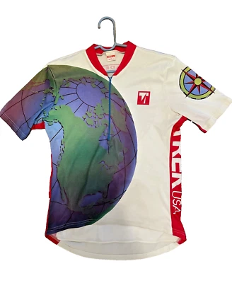 Camiseta de ciclismo Trek EUA feminina L 1/4 com zíper matriz vintage montada pelo mundo - Imagem 1 de 4