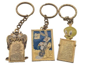 3-Looney Tunes Briefmarkensammlung-Schlüsselanhänger-Käfer Hase-Tweety Vogel-Tasmanischer Teufel - Bild 1 von 13