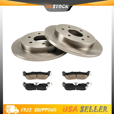 For Nissan Titan Armada QX56 2005-2015 Rear Disc Rotors + Ceramic Brake Pads - Image 1 of 4