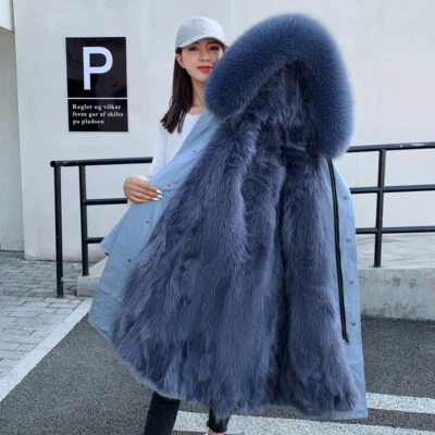 Abrigo chaqueta cálida Parkas de invierno forrada de piel de zorro real con capucha para mujer de lujo Foto 1 de 4