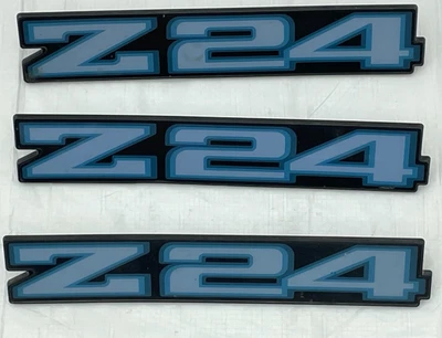 Chevy Cavalier Z24 1987 panel basculante emblemas insignias azules adornos adornos lote de 3 Foto 1 de 4
