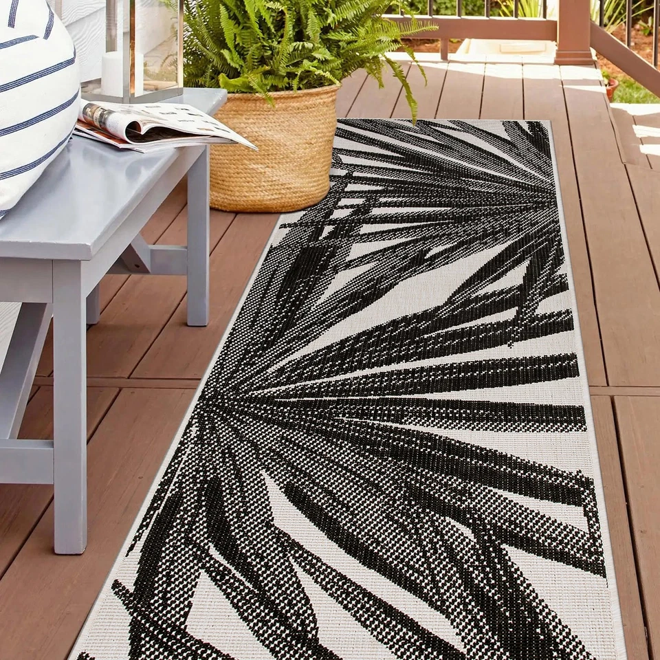 Alfombra de exterior Rugshop hojas tropicales reversible interior exterior alfombra negra Foto 1 de 2