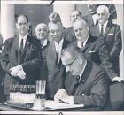 1964 Press Photo Us Senators Expectantly Watch Pres Johnson Sign Pay Raise Bill