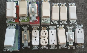 MISCELLANEOUS LOT OF 15 LEVITON/EATON OUTLETS AND SWITCHES/SOME TAMPER RESISTANT - Picture 1 of 4