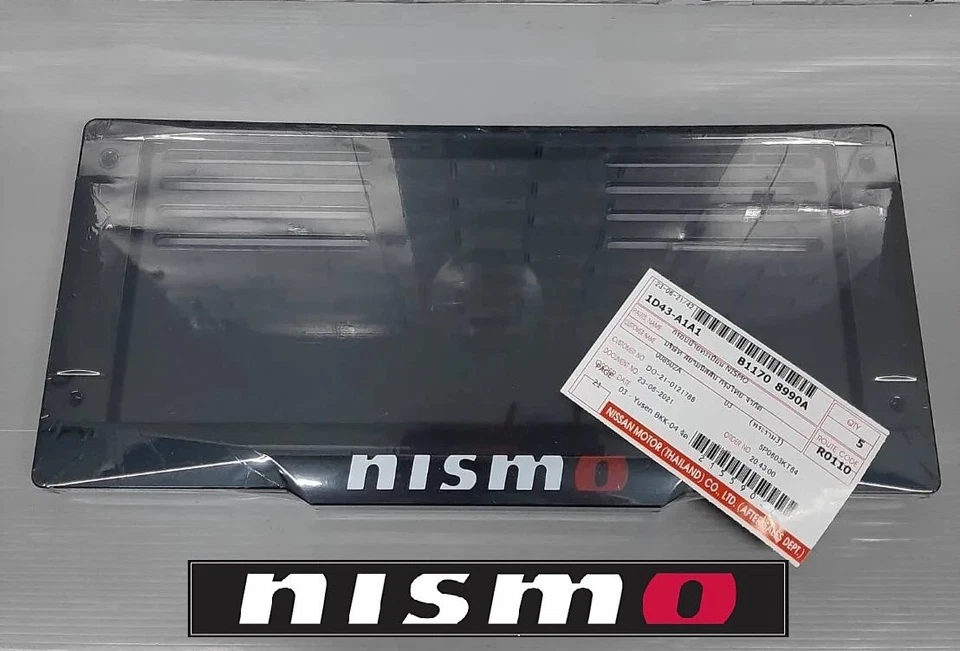 Marco de matrícula NISMO genuino Nissan B1170-8990A Foto 1 de 4