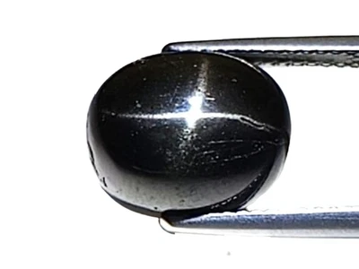 7.78Cts Black natural star diopside oval cabochon loose gemstones "see video" - Image 1 of 2