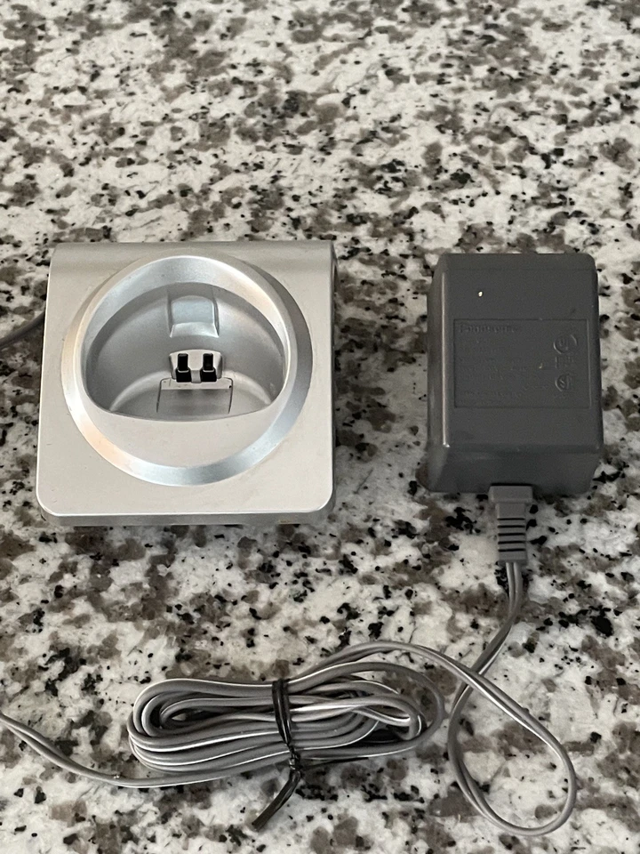 Base de carga Panasonic PQLV30053ZAS con adaptador de CA PQLV209 para KX-TGA101S Foto 1 de 4