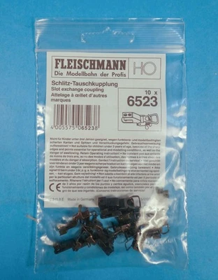 FLEISCHMANN 6523 HO SLOT-EXCHANGE ACOPLADORES ESTILO MARKLIN-PAQUETE COMO NUEVO DE 10 con PINES Foto 1 de 2