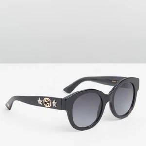 Gafas de sol GUCCI marco redondo polarizado acetato con estrellas en negro GG0207S - Imagen 1 de 4