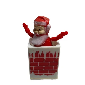 Vintage Thumb Controlled Santa Pops Out of Chimney and Dances Toys - Picture 1 of 4