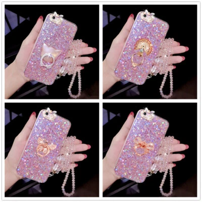 Funda protectora con soporte de anillo de diamantes de imitación brillante para varios teléfonos para mujer Foto 1 de 4
