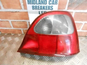 ROVER 25 2002 OSR LADO DEL CONDUCTOR LUZ TRASERA Y SOPORTE BOMBILLA INDICADOR FRENO - Imagen 1 de 2